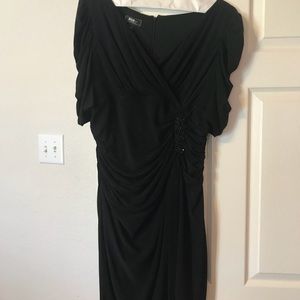 Black dress with beaded detail.